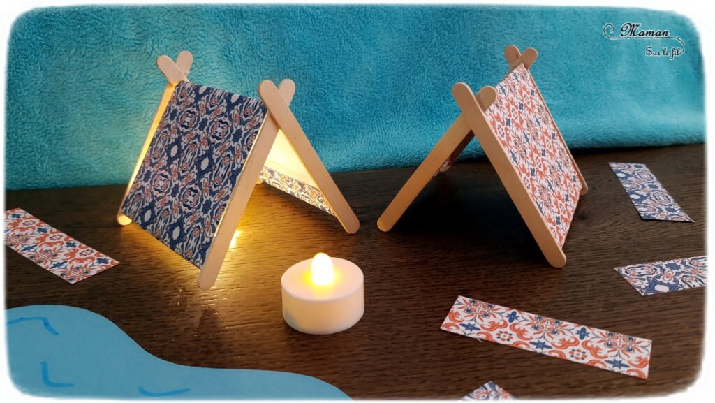 Fabriquer des mini tentes en récup' et papier : activité créative, recyclage et manuelle enfants - Surcyclage de bâtonnets de glace en bois - Bricolage facile pour jeu DIY (pour figurines, poupées, Playmobil... - Découpage, collage de papier - Campement avec deux tentes, un lac, un plan d'eau et un feu de camp (bougie) - Thème camping, vacances, été, colonies, camp d'été - Bricolage et décoration sympa et facile - Arts visuels maternelle et élémentaire - Cycles 1 et 2 - Créativité - tutoriel photos - mslf