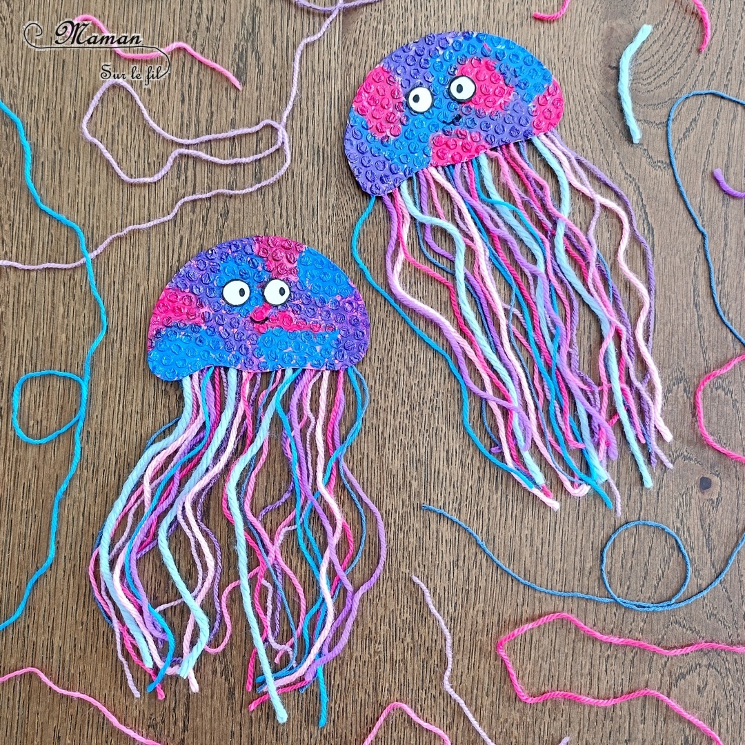 Fabriquer des méduses en papier à bulles et laine : activité créative, peinture, récup' et manuelle enfants - Recyclage et Surcyclage de papier à bulles et de chutes de laines et fils - Peinture rose, bleue, violette sur le papier à bulles - Consolidation avec du papier cartonné - Scotchage de la laine au dos - Yeux rigolos - Bricolage facile et rigolo - Thème animaux marins, océans, mer, été - Bricolage et décoration sympa et facile - Arts visuels maternelle et élémentaire - Cycles 1 et 2 - Créativité - tutoriel photos - mslf
