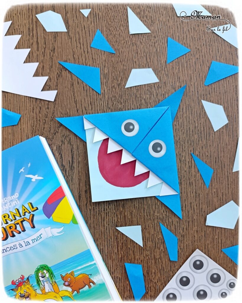 Fabriquer un marque-page Requin DIY en papier : activité créative et manuelle enfants - Pliage de papier et origami - Customisation en requin - Découpage, collage, coloriage et dessin - Cadeau à offrir Fait maison- Bricolage facile et rigolo - Thème animaux marins, océans, mer, été - Bricolage et décoration sympa et facile - Arts visuels maternelle et élémentaire - Cycles 1 et 2 - Créativité - tutoriel photos - mslf