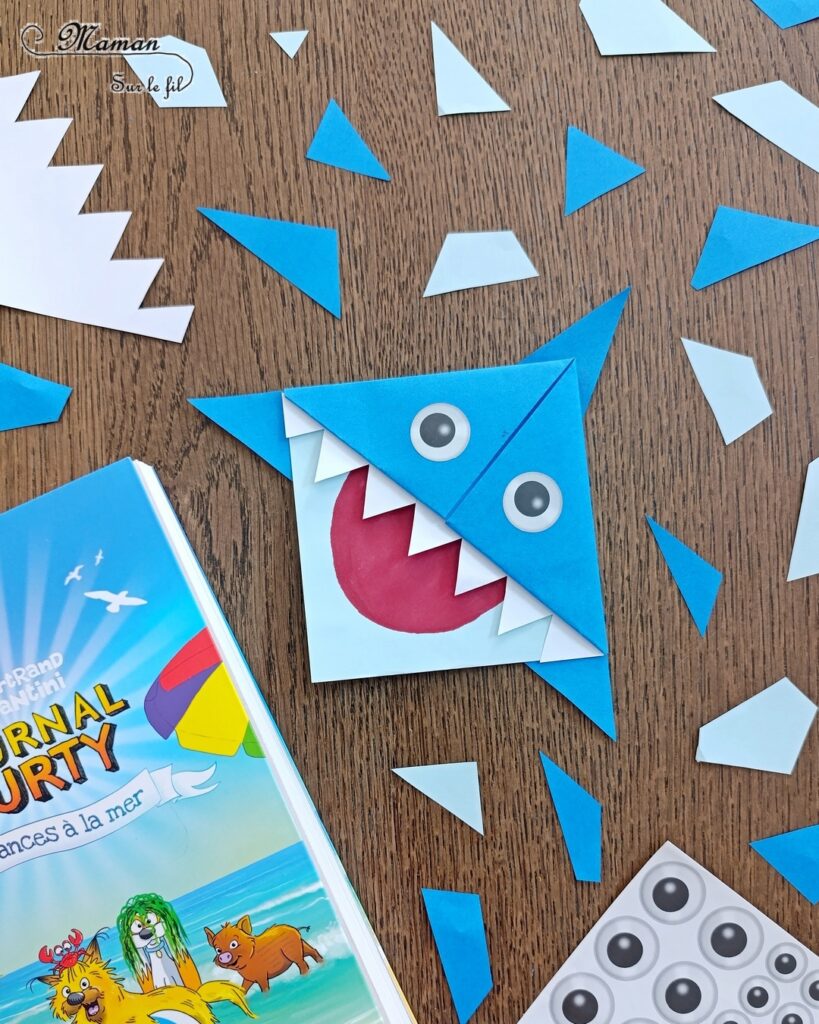 Fabriquer un marque-page Requin DIY en papier : activité créative et manuelle enfants - Pliage de papier et origami - Customisation en requin - Découpage, collage, coloriage et dessin - Cadeau à offrir Fait maison- Bricolage facile et rigolo - Thème animaux marins, océans, mer, été - Bricolage et décoration sympa et facile - Arts visuels maternelle et élémentaire - Cycles 1 et 2 - Créativité - tutoriel photos - mslf