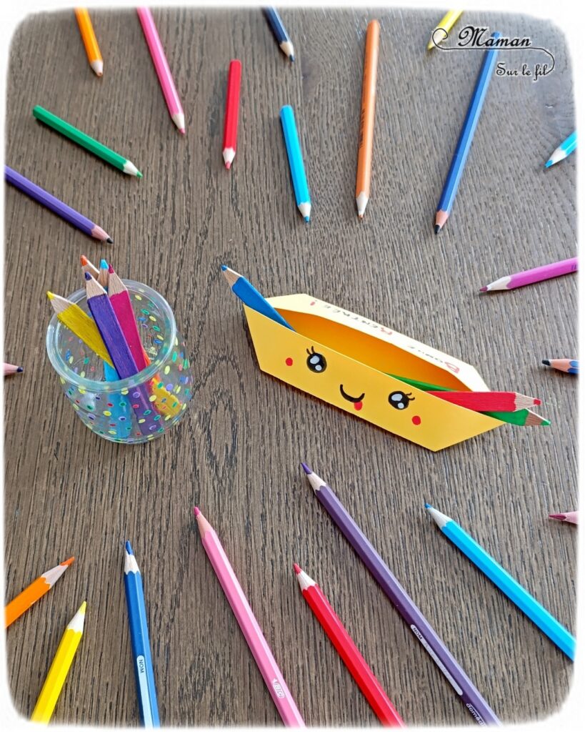 Fabriquer un décompte pour la rentrée scolaire : activité créative, récup' et manuelle enfants - Crayons de couleur arc-en-ciel fabriqués avec des bâtonnets de glace en bois - Peinture, recyclage, récup', surcyclage - Trousse Kawaii en papier avec la technique de l'origami - Pot à crayons avec un pot en verre - Chaque jour, on passe un crayon du pot vers la trousse - Quand la trousse est remplie, c'est la rentrée - Bricolage DIY facile et rapide - Thème école, rentrée scolaire, matériel, crayons de couleur - Bricolage et décoration sympa et facile - Arts visuels maternelle et élémentaire - Cycles 1 et 2 - Créativité - tutoriel photos - mslf