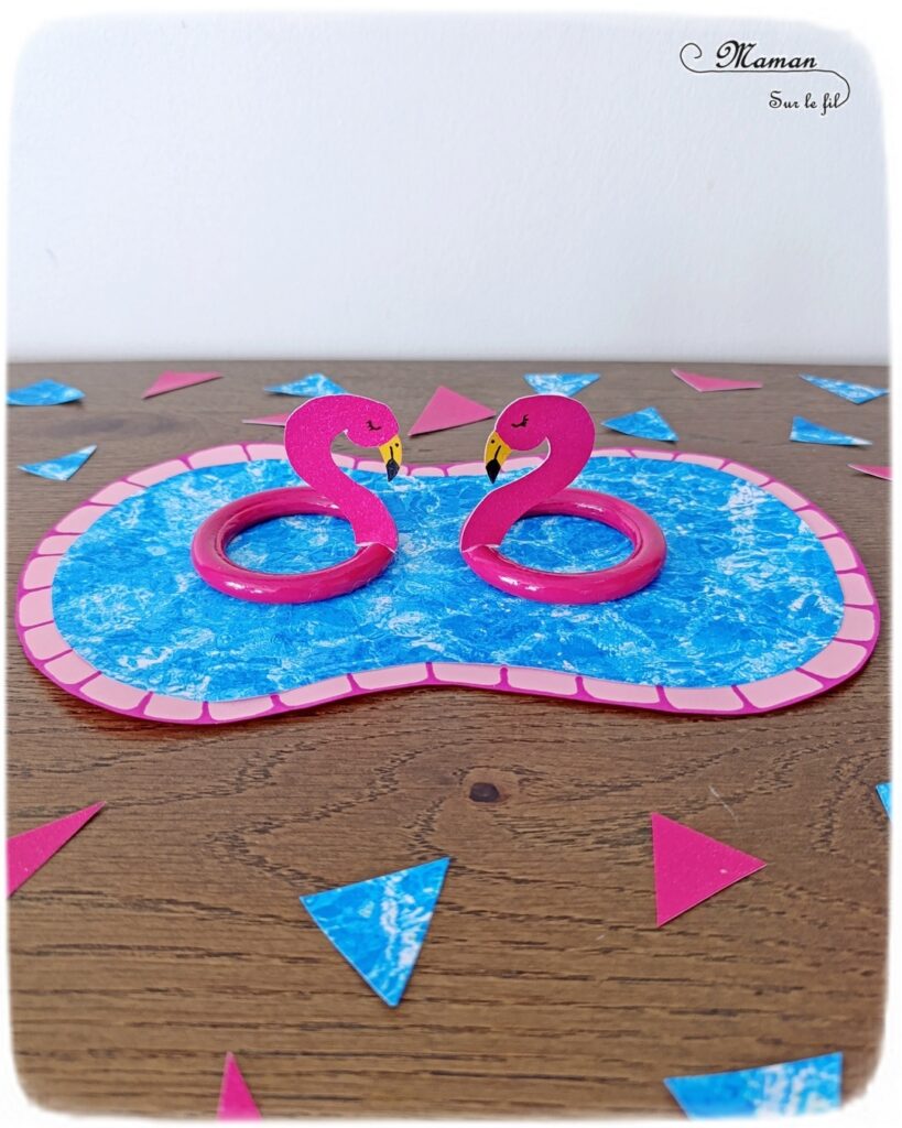 Fabriquer des bouées Flamants Roses avec des anneaux de rideaux : activité créative, récup', peinture et manuelle enfants - Peindre les anneaux de rideaux en rose - Découper et dessiner les têtes de flamants roses dans du papier rose - Piscine en papier avec eau imprimée - Bricolage facile et rapide pour jeu DIY (pour figurines, poupées, Playmobil... - Thème été, vacances, piscine, camping, oiseaux - Bricolage et décoration sympa et facile - Arts visuels maternelle et élémentaire - Cycles 1 et 2 - Créativité - tutoriel photos - mslf