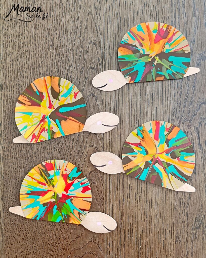 Peindre des escargots d'automne à l'essoreuse à salade : activité créative, peinture, récup' et manuelle enfants - Technique de peinture rigolote et recyclage, surcyclage de cuillères en bois - Coquilles peintes à l'essoreuse - Corps, tête et queue avec cuillères - Antennes et yeux avec fils chenille et perles - Géométrie, utilisation du compas, découpage - Couleurs automnales - Bricolage DIY facile et rapide - Thème automne, animaux de la forêt, des bois, insectes et autres petites bêtes - Décoration DIY - Bricolage et décoration sympa et facile - Arts visuels maternelle et élémentaire - Cycles 1 et 2 - Créativité - tutoriel photos - mslf