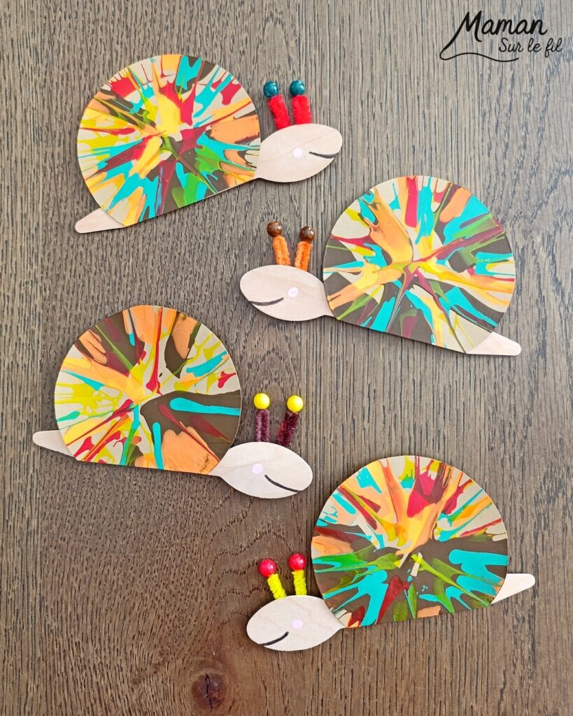Peindre des escargots d'automne à l'essoreuse à salade : activité créative, peinture, récup' et manuelle enfants - Technique de peinture rigolote et recyclage, surcyclage de cuillères en bois - Coquilles peintes à l'essoreuse - Corps, tête et queue avec cuillères - Antennes et yeux avec fils chenille et perles - Géométrie, utilisation du compas, découpage - Couleurs automnales - Bricolage DIY facile et rapide - Thème automne, animaux de la forêt, des bois, insectes et autres petites bêtes - Décoration DIY - Bricolage et décoration sympa et facile - Arts visuels maternelle et élémentaire - Cycles 1 et 2 - Créativité - tutoriel photos - mslf