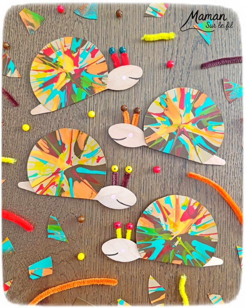 Peindre des escargots d'automne à l'essoreuse à salade : activité créative, peinture, récup' et manuelle enfants - Technique de peinture rigolote et recyclage, surcyclage de cuillères en bois - Coquilles peintes à l'essoreuse - Corps, tête et queue avec cuillères - Antennes et yeux avec fils chenille et perles - Géométrie, utilisation du compas, découpage - Couleurs automnales - Bricolage DIY facile et rapide - Thème automne, animaux de la forêt, des bois, insectes et autres petites bêtes - Décoration DIY - Bricolage et décoration sympa et facile - Arts visuels maternelle et élémentaire - Cycles 1 et 2 - Créativité - tutoriel photos - mslf