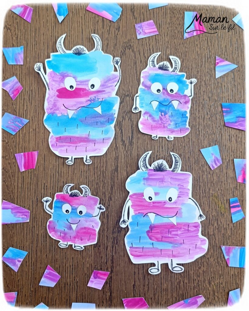 Peindre une famille de petits monstres mignons et colorés : activité créative, peinture et manuelle enfants - Peinture façon aquarelle - Bandes gribouillées - Couleurs bleu, rose et violet - Dessin des détails en noir pour le contraste - Découpage et collage des yeux et dents pour un air rigolo - Bricolage et décoration DIY et facile - Bricolage Fait maison, décoration - Thème Halloween, créatures imaginaires, monstres - Bricolage sympa et facile - Arts visuels Maternelle et cycle 2 - Maternelle et élémentaire - Créativité - Cycle 1 ou 2 - tutoriel photos - mslf