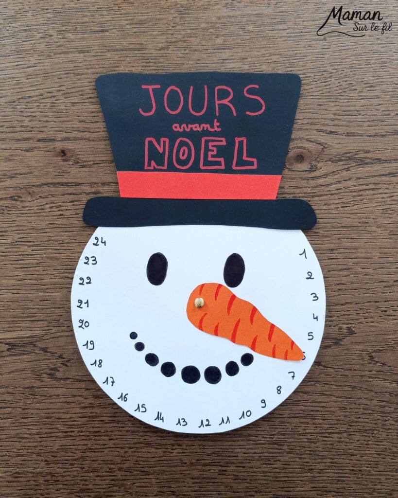 Fabriquer un décompte de l'Avent DIY - Bonhomme de neige : activité créative et manuelle enfants - Nez Carotte qui tourne et permet de décompter les jours pour patienter avant Noël - Calendrier, décompte de l'Avent, de Noël fait maison en papier - Version PDF à télécharger et imprimer gratuitement - Printable gratuit - Bricolage et décoration DIY - Bricolage Fait maison, décoration - Thème Hiver, froid, neige, Noël, Avent - Bricolage sympa et facile - Arts visuels Maternelle et cycle 2 - Maternelle et élémentaire - Créativité - Cycle 1 ou 2 - tutoriel photos et vidéo - mslf