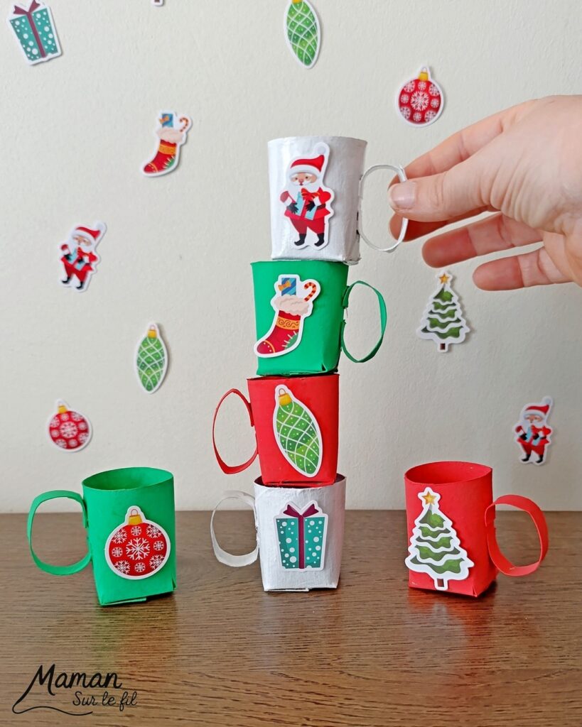Fabriquer un jeu DIY : les tasses de Noël à empiler : activité créative, récup' et manuelle enfants - Tasses aux couleurs de Noël fabriquées avec des rouleaux de PQ - Recyclage, surcyclage de rouleaux de papier toilette en carton - Peinture, gommettes - - Jeu fait maison - Sens de l'équilibre - Empiler les tasses sans les faire tomber - Vert, rouge, blanc - Bricolage et décoration DIY et facile - Bricolage Fait maison, décoration - Thème Noël, fêtes de fin d'année, hiver, boissons chaudes - Bricolage sympa et facile - Arts visuels Maternelle et cycle 2 - Maternelle et élémentaire - Créativité - Cycle 1 ou 2 - tutoriel photos et vidéo - mslf