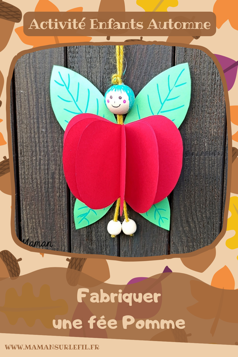 Fabriquer une fée pomme à suspendre : activité créative, papier et manuelle enfants - Pomme en volume en découpant et collant plusieurs pommes - Découpage, collage - Tête et pieds avec des perles en bois - Suspension avec un morceau de laine - Ailes de la fée comme des feuilles - Bricolage et décoration DIY et facile - Bricolage Fait maison, décoration - Thème pommes, fruits et légumes, potager, verger, automne, printemps, créatures légendaires, imaginaires, fées - Bricolage sympa et facile - Arts visuels Maternelle et cycle 2 - Maternelle et élémentaire - Créativité - Cycle 1 ou 2 - tutoriel photos - mslf