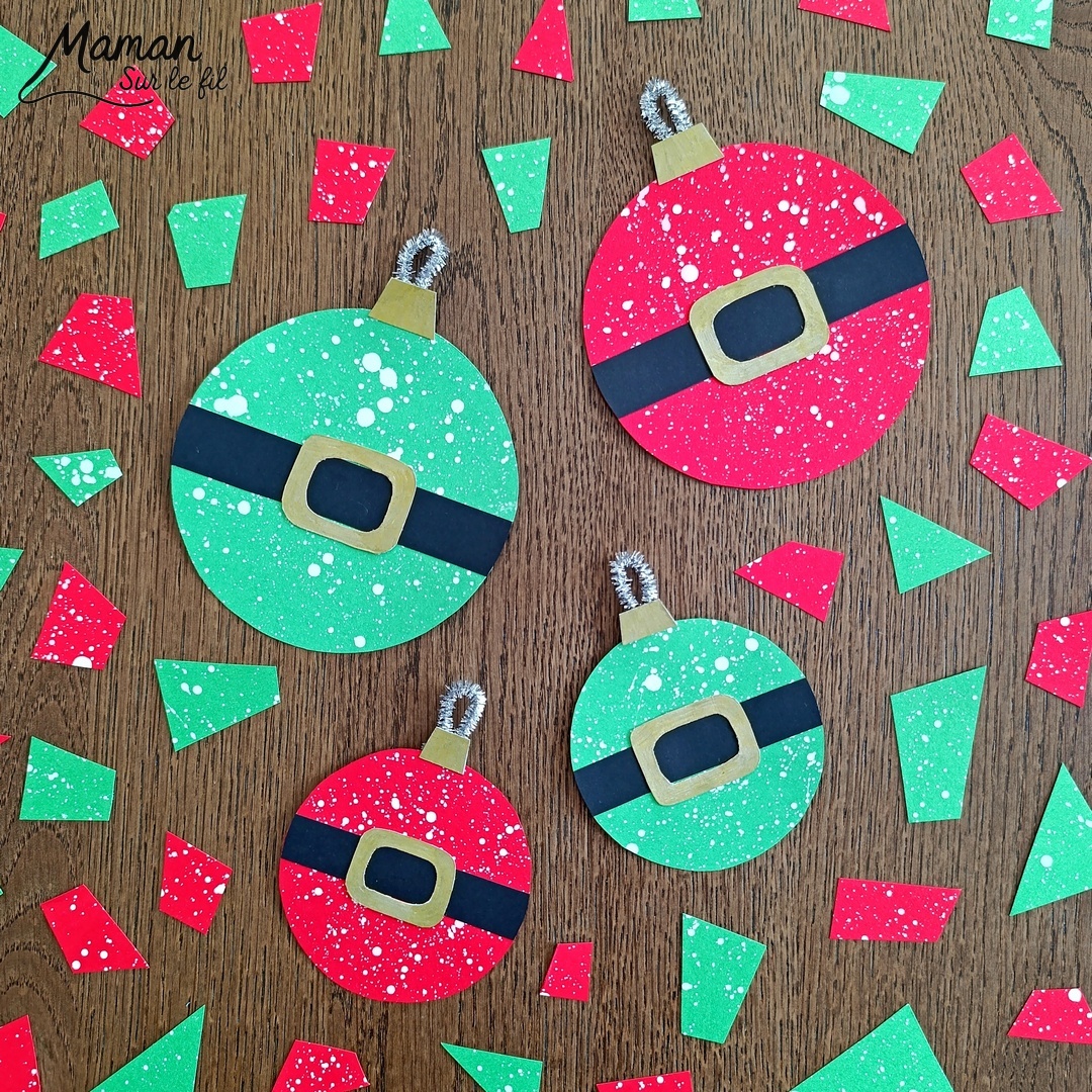 Créer des boules à suspendre façon Père Noël et Lutin : activité créative et manuelle enfants - Découpage et collage de papier -Peinture éclaboussée blanche - Géométrie, utilisation d'un compas, cercle - Feutre doré pour les détails de la ceinture - Fil chenille argenté pour accrocher les boules de Noël - Bricolage rigolo et décoration DIY et facile - Bricolage Fait maison, décoration - Thème Noël, fêtes de fin d'année, décorations pour le sapin, Lutins du père Noêl - Bricolage sympa et facile - Arts visuels Maternelle et cycle 2 - Maternelle et élémentaire - Créativité - Cycle 1 ou 2 - tutoriel photos - mslf