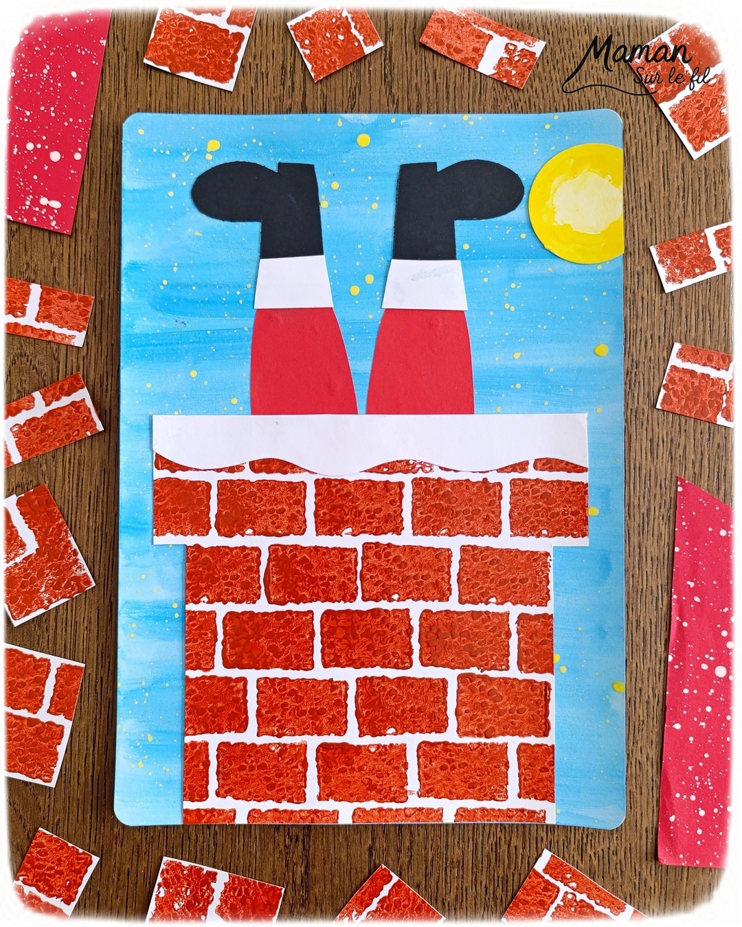 Créer un Père Noël à l'envers dans la cheminée : activité créative et manuelle enfants - Découpage et collage de papier -Fond en peinture type aquarelle et peinture éclaboussée jaune pour les étoiles - Cheminée peinte avec une éponge pour la texture et la forme des briques - Papier blanc pour la neige - - Bricolage rigolo et décoration DIY et facile - Bricolage Fait maison, décoration - Thème hiver, froid, Noël, fêtes de fin d'année - Bricolage sympa et facile - Arts visuels Maternelle et cycle 2 - Maternelle et élémentaire - Créativité - Cycle 1 ou 2 - tutoriel photos - mslf