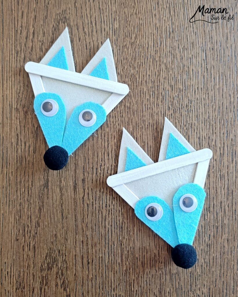Fabriquer des renards polaires avec des bâtonnets de glace en bois : activité créative, récup' et manuelle enfants - Recyclage, surcyclage de bâtonnets de glace - Peinture, feutrine, pompons et yeux mobiles pour les détails - Version arctique et hivernale des renards roux - Cadeau à offrir Fait maison - Bricolage facile et rigolo - Thème animaux du froid, de la banquise, neige, pôles, hiver - Bricolage et décoration sympa et facile - Arts visuels maternelle et élémentaire - Cycles 1 et 2 - Créativité - tutoriel photos - mslf