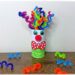 Fabriquer un clown aux cheveux avec un rouleau de PQ en carton : activité créative, récup', peinture et manuelle enfants - Recyclage, surcyclage d'un rouleau de papier toilette - Peindre une bande de papier avec peinture fluo - Pompon pour le nez - Cheveux frisés avec des fils chenille ondulé - Yeux mobiles, noeud papillon en carton - Bricolage facile, coloré et rigolo - Thème Carnaval, Mardi-Gras, cirque, anniversaire et fêtes - Bricolage et décoration sympa et facile - Arts visuels maternelle et élémentaire - Cycles 1 et 2 - Créativité - tutoriel photos - mslf
