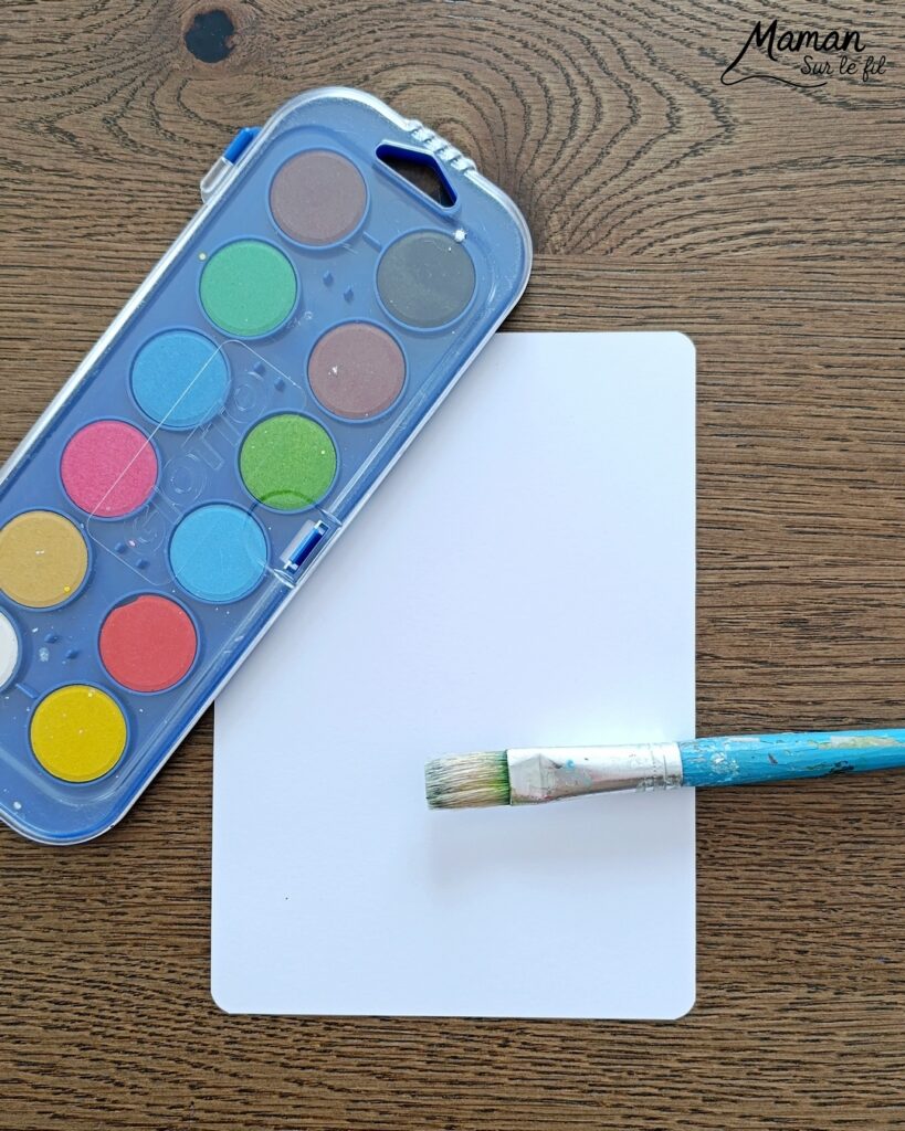 Créer une fleur en noir et blanc sur fond coloré Arc-en-ciel : activité créative, peinture et manuelle enfants - Peinture type aquarelle - Tracé de lignes horizontales aux couleurs de l'arc-en-ciel - Dessin de la fleur au feutre noir - Découpage, collage, contraste - Cadeau DIY, fait maison à offrir - Bricolage facile - Thème fleurs, nature, printemps - Bricolage et décoration sympa et facile - Arts visuels maternelle et élémentaire - Cycles 1 et 2 - Créativité - tutoriel photos - mslf