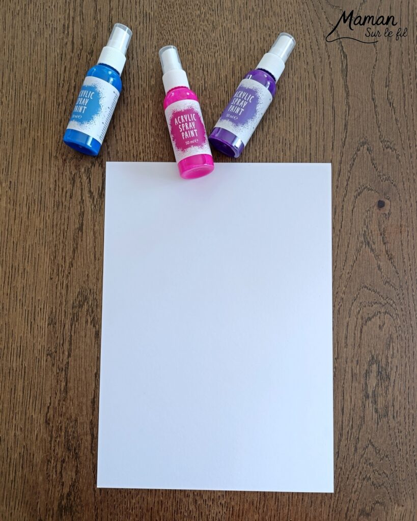 Peindre un oeuf de Pâques avec des empreintes de gommettes en mousse : activité créative, peinture et manuelle enfants - Fond en peinture en spray - Pulvérisation de peinture - Couleurs vives pour contraste avec le noir - Collage de gommettes épaisses en mousse pour créer l'oeuf de Pâques - Peinture noir pour utiliser comme tampon - Décoration DIY Fait maison - Bricolage facile - Thème Pâques, gourmandises, chocolat, oeufs - Bricolage et décoration sympa et facile - Arts visuels maternelle et élémentaire - Cycles 1 et 2 - Créativité - tutoriel photos et vidéo - mslf