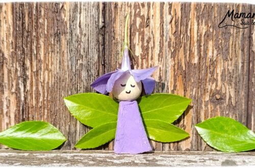 Créer une fée Nature du printemps : activité créative, récup', peinture, nature et manuelle enfants - Recyclage, surcyclage de boites à oeufs - Découper et peindre un pic en carton - Ailes avec des feuilles vertes - Tête avec perle en bois - Cheveux et chapeau avec fleur violette - Utiliser les trésors du printemps - Land Art, atelier nature, école dehors - Décoration éphémère DIY Fait maison - Cadeau DIY, fait maison à offrir - Bricolage facile et rapide - Thème fleurs, nature, printemps, personnages imaginaires et féériques - Bricolage et décoration sympa et facile - Arts visuels maternelle et élémentaire - Cycles 1 et 2 - Créativité - tutoriel photos - mslf
