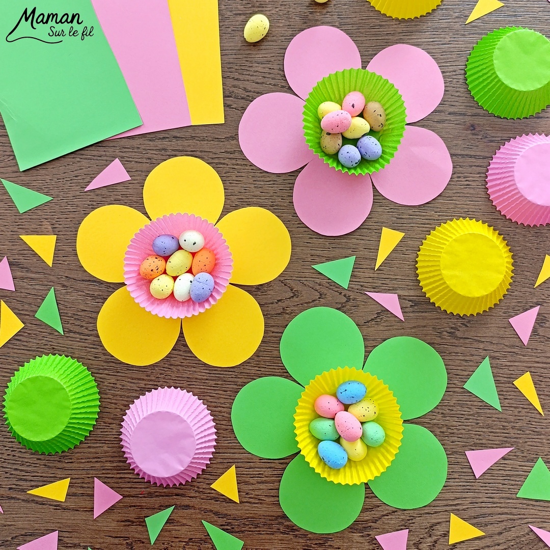 Fabriquer des fleurs printanières remplies d'oeufs de Pâques : activité créative et manuelle enfants - Activité de transition entre le printemps et Pâques - Fleurs aux couleurs de printemps avec papier et caissettes à cupcake - - Coeur comme un panier rempli de petits oeufs de Pâques en sucre ou en polystyrène - Décoration DIY Fait maison - Cadeau DIY, fait maison à offrir - Bricolage facile - Thème fleurs, nature, printemps, Pâques, gourmandises, chocolat, bonbons - Bricolage et décoration sympa et facile - Arts visuels maternelle et élémentaire - Cycles 1 et 2 - Créativité - tutoriel photos - mslf