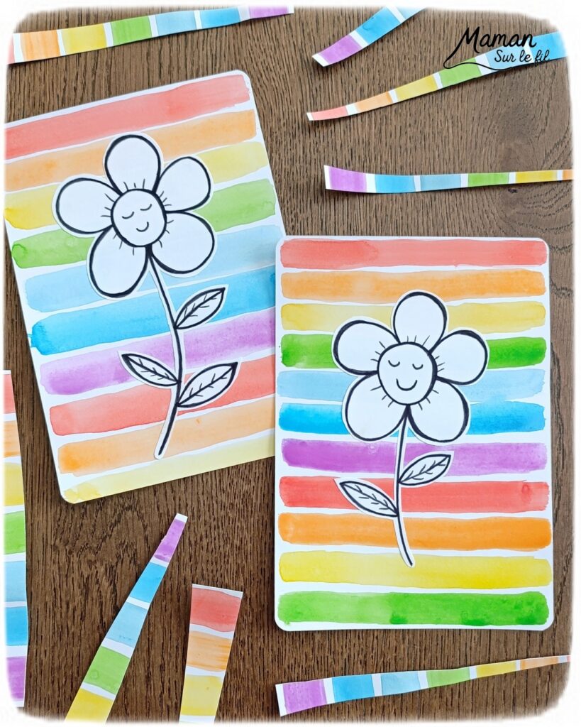 Créer une fleur en noir et blanc sur fond coloré Arc-en-ciel : activité créative, peinture et manuelle enfants - Peinture type aquarelle - Tracé de lignes horizontales aux couleurs de l'arc-en-ciel - Dessin de la fleur au feutre noir - Découpage, collage, contraste - Cadeau DIY, fait maison à offrir - Bricolage facile - Thème fleurs, nature, printemps - Bricolage et décoration sympa et facile - Arts visuels maternelle et élémentaire - Cycles 1 et 2 - Créativité - tutoriel photos - mslf