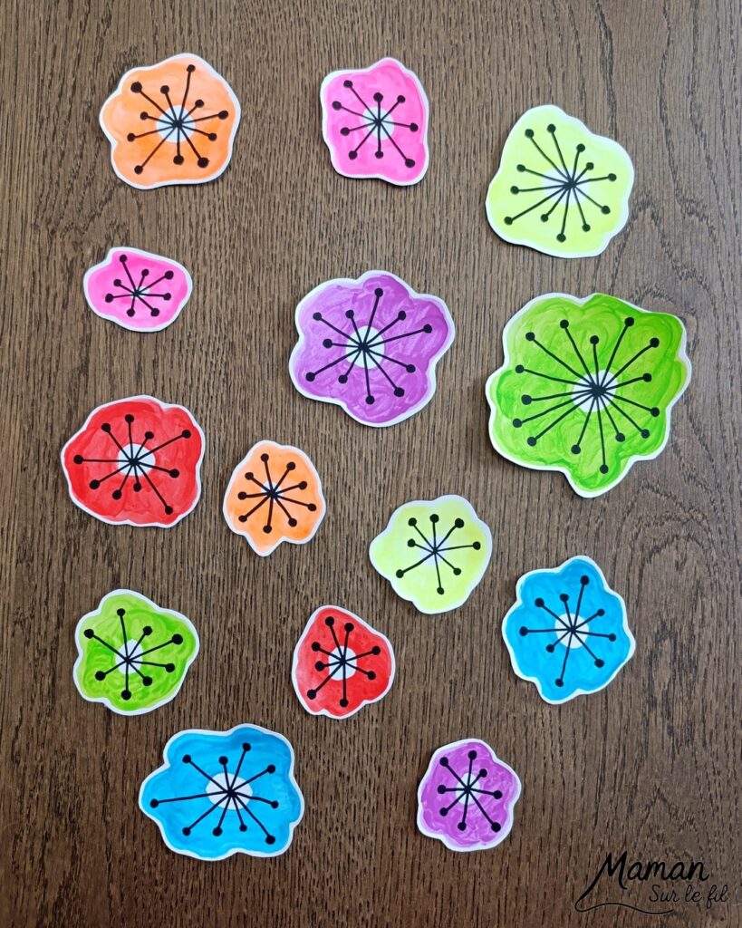 Créer un champ de fleurs Arc-en-ciel avec graphismes noirs : activité créative, peinture, dessins et manuelle enfants - Peindre des tâches aux couleurs de l'arc-en-ciel avec de la peinture type aquarelle pour enfants - Couleurs fluos - Découpage et collage - Dessins et fond noirs pour le contraste - Décoration DIY Fait maison - Arts visuels et Bricolage facile - Thème fleurs, nature, printemps, jardin, météo - Bricolage et décoration sympa et facile - Arts visuels maternelle et élémentaire - Cycles 1 et 2 - Créativité - tutoriel photos - mslf