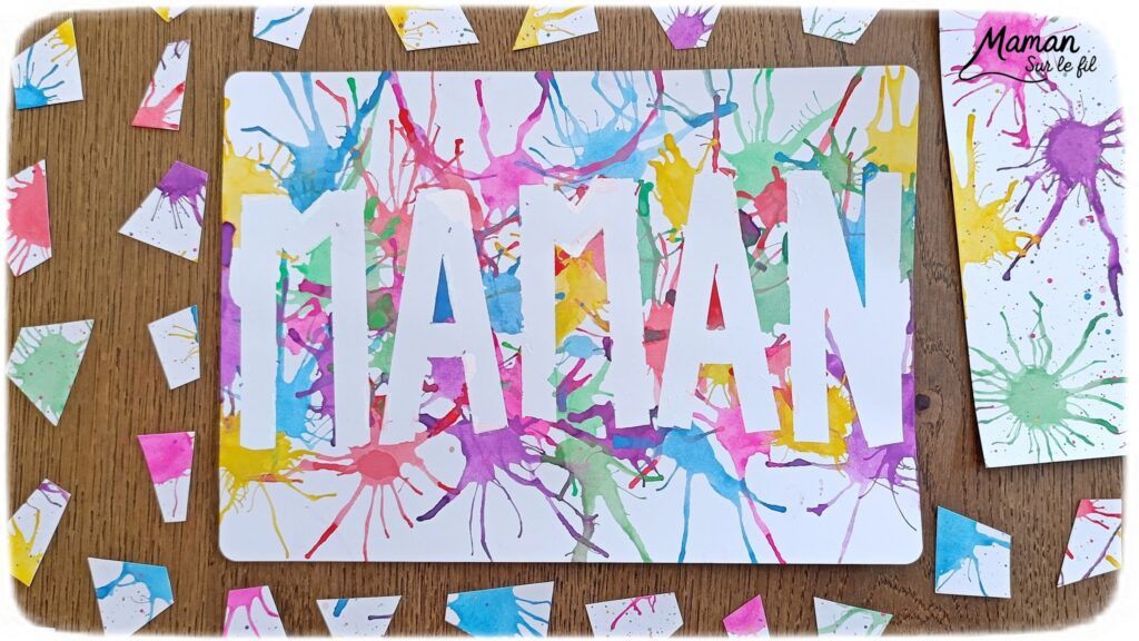 Créer une carte Maman en peinture soufflée à la paille : activité créative, peinture et manuelle enfants - Mot Maman écrit au washi ou masking tape - Tâches de peinture colorées soufflée à la paille pour un effet moderne, pop art, tag - Carte colorée, joyeux pour la fête des mères ou des pères - Cadeau DIY - Décoration DIY Fait maison - Arts visuels et Bricolage facile - Thème amour, amitié, Saint Valentin, fête des grands-mères, mères, grands-pères, pères - Bricolage et décoration sympa et facile - Arts visuels maternelle et élémentaire - Cycles 1 et 2 - Créativité - tutoriel photos - mslf