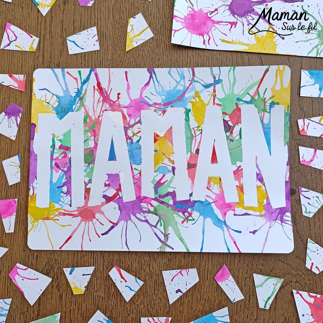 Créer une carte Maman en peinture soufflée à la paille : activité créative, peinture et manuelle enfants - Mot Maman écrit au washi ou masking tape - Tâches de peinture colorées soufflée à la paille pour un effet moderne, pop art, tag - Carte colorée, joyeux pour la fête des mères ou des pères - Cadeau DIY - Décoration DIY Fait maison - Arts visuels et Bricolage facile - Thème amour, amitié, Saint Valentin, fête des grands-mères, mères, grands-pères, pères - Bricolage et décoration sympa et facile - Arts visuels maternelle et élémentaire - Cycles 1 et 2 - Créativité - tutoriel photos - mslf