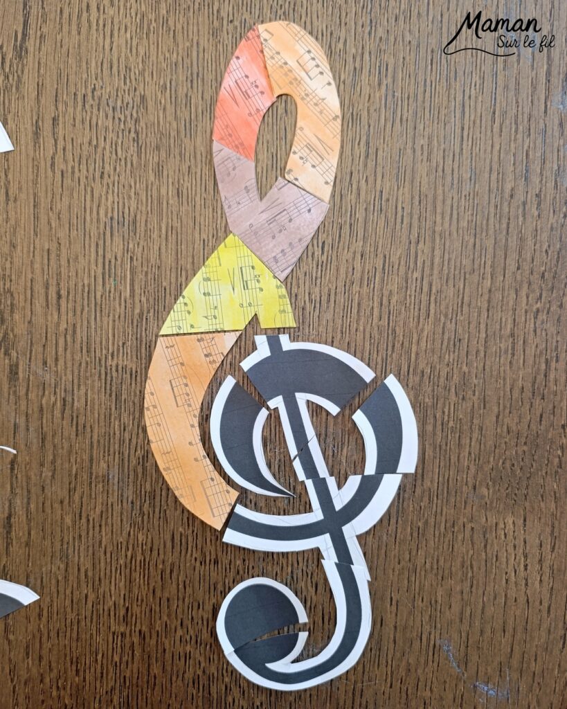 Créer une clé de sol avec des partitions colorées : activité créative, peinture et manuelle enfants - Peindre des partitions avec de la peinture type aquarelle - Travail autour des couleurs froides et chaudes - Découpage et collage - Dessins et contours en noir - Décoration DIY Fait maison - Arts visuels et Bricolage facile - Thème fête de la musique, instruments de musique, été - Bricolage et décoration sympa et facile - Arts visuels maternelle et élémentaire - Cycles 1 et 2 - Créativité - tutoriel photos - mslf