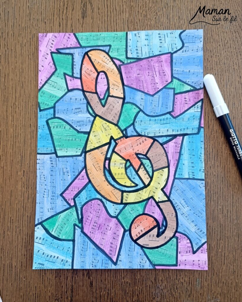 Créer une clé de sol avec des partitions colorées : activité créative, peinture et manuelle enfants - Peindre des partitions avec de la peinture type aquarelle - Travail autour des couleurs froides et chaudes - Découpage et collage - Dessins et contours en noir - Décoration DIY Fait maison - Arts visuels et Bricolage facile - Thème fête de la musique, instruments de musique, été - Bricolage et décoration sympa et facile - Arts visuels maternelle et élémentaire - Cycles 1 et 2 - Créativité - tutoriel photos - mslf