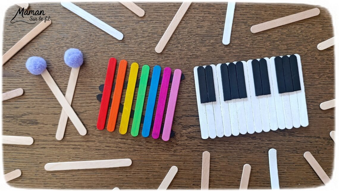 Fabriquer des instruments de musique avec des bâtonnets de glace en bois : activité créative, récup', peinture et manuelle enfants - Recyclage, surcyclage de bâtonnets de glace en bois - Gouache en stick aux couleurs de l'arc-en-ciel pour le xylophone - Pompons pour les baguettes - Noir et blanc pour le clavier de piano - Décoration DIY Fait maison - Arts visuels et Bricolage facile - Thème fête de la musique, instruments de musique, été - Bricolage et décoration sympa et facile - Arts visuels maternelle et élémentaire - Cycles 1 et 2 - Créativité - tutoriel photos - mslf