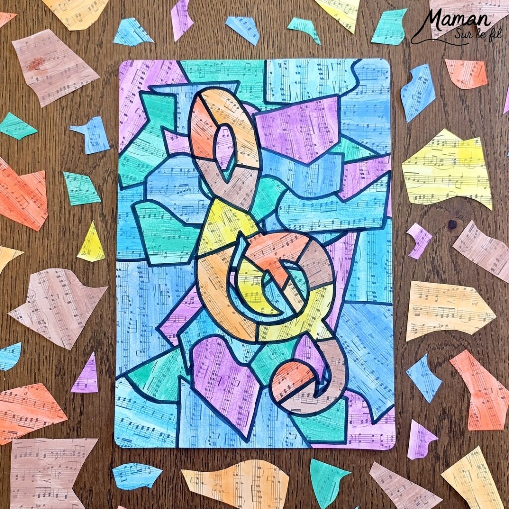 Créer une clé de sol avec des partitions colorées : activité créative, peinture et manuelle enfants - Peindre des partitions avec de la peinture type aquarelle - Travail autour des couleurs froides et chaudes - Découpage et collage - Dessins et contours en noir - Décoration DIY Fait maison - Arts visuels et Bricolage facile - Thème fête de la musique, instruments de musique, été - Bricolage et décoration sympa et facile - Arts visuels maternelle et élémentaire - Cycles 1 et 2 - Créativité - tutoriel photos - mslf