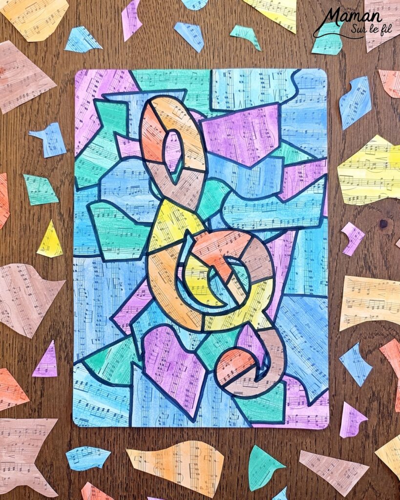 Créer une clé de sol avec des partitions colorées : activité créative, peinture et manuelle enfants - Peindre des partitions avec de la peinture type aquarelle - Travail autour des couleurs froides et chaudes - Découpage et collage - Dessins et contours en noir - Décoration DIY Fait maison - Arts visuels et Bricolage facile - Thème fête de la musique, instruments de musique, été - Bricolage et décoration sympa et facile - Arts visuels maternelle et élémentaire - Cycles 1 et 2 - Créativité - tutoriel photos - mslf