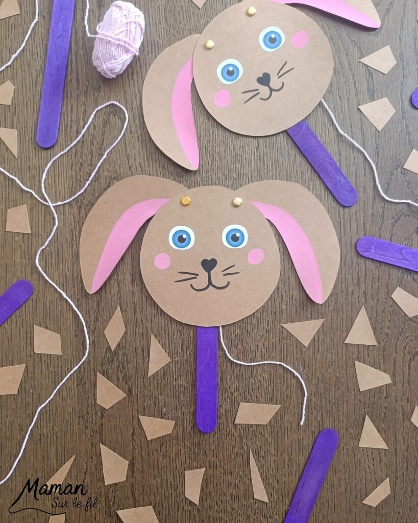 Fabriquer un lapin mignon aux oreilles articulées : activité créative, papier et manuelle enfants - Bricolage rigolo type marionnette - Découpage de papier - Récup', recyclage, surcyclage de bâtonnet de glace en bois - Articulation avec attaches parisiennes et fils / laine - Gommettes, dessin et coloriage - Arts visuels et Bricolage facile - Thème animaux de la ferme, campagne, pâques - Bricolage et décoration sympa et facile - Arts visuels maternelle et élémentaire - Cycles 1 et 2 - Créativité - tutoriel photos et vidéo - mslf