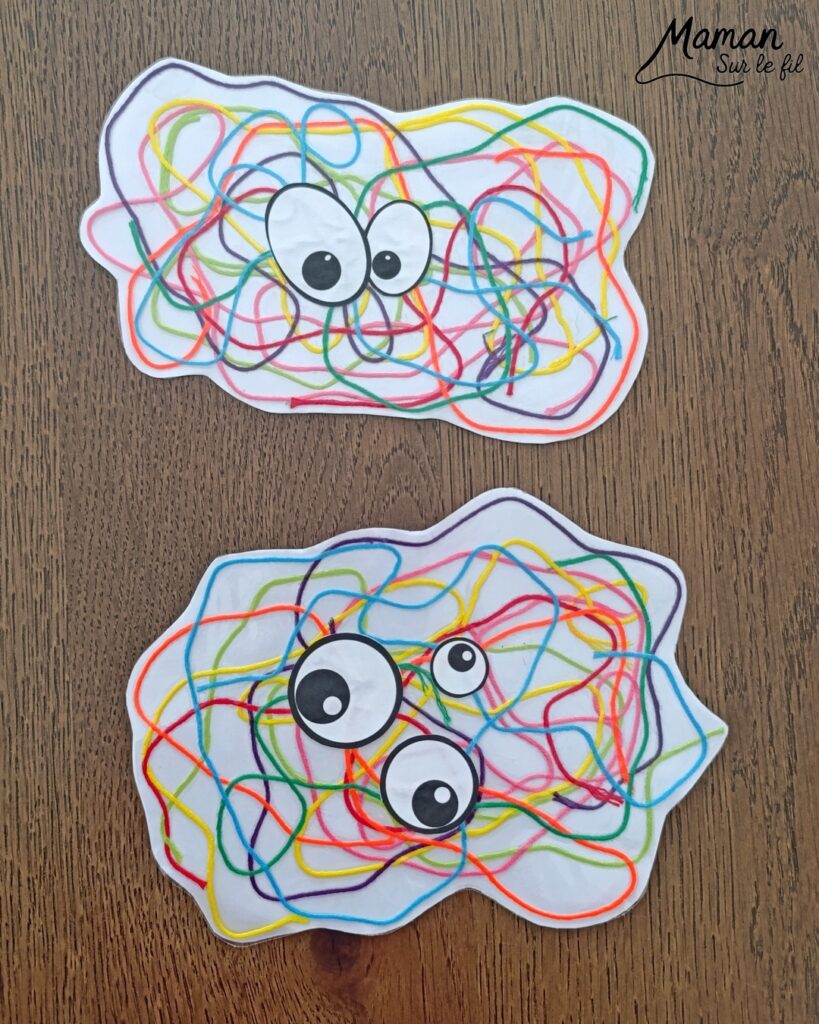 Créer des monstres colorés en laine plastifiée : activité créative, rigolote et manuelle - Laine, fils de broderie multicolores collé ou plastifié pour faire une forme aléatoire de monstres - Yeux rigolos découpés et collés pour finir - Découpage, collage - Tête de monstre rigolote - Bricolage et décoration DIY et facile - Bricolage Fait maison, décoration - Thème Halloween, monstres, créatures imaginaires et légendaires - Bricolage sympa et facile - Arts visuels Maternelle et cycle 2 - Maternelle et élémentaire - Créativité - Cycle 1 ou 2 - tutoriel photos et vidéo - mslf