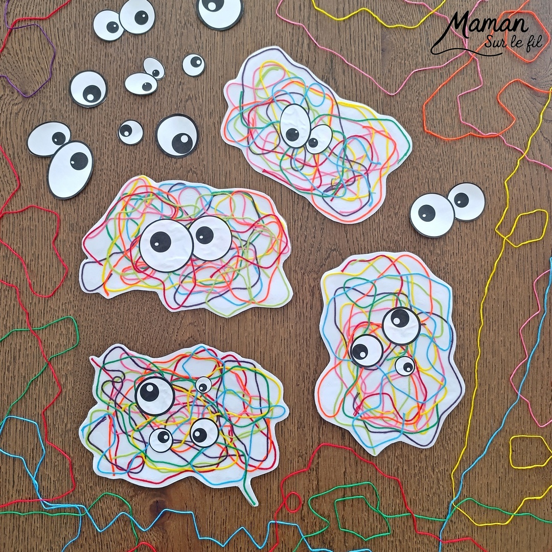 Créer des monstres colorés en laine plastifiée : activité créative, rigolote et manuelle - Laine, fils de broderie multicolores collé ou plastifié pour faire une forme aléatoire de monstres - Yeux rigolos découpés et collés pour finir - Découpage, collage - Tête de monstre rigolote - Bricolage et décoration DIY et facile - Bricolage Fait maison, décoration - Thème Halloween, monstres, créatures imaginaires et légendaires - Bricolage sympa et facile - Arts visuels Maternelle et cycle 2 - Maternelle et élémentaire - Créativité - Cycle 1 ou 2 - tutoriel photos et vidéo - mslf